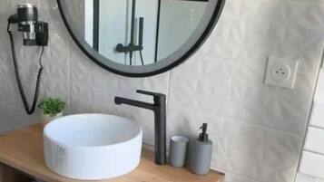 Hair dryer, towels, soap, toilet paper