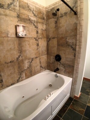 Shower, hair dryer, towels, shampoo