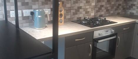 Apartment | Private kitchen | Fridge, microwave, oven, stovetop