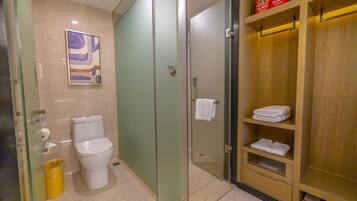 Shower, hair dryer, slippers, towels