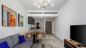 Leilighet – deluxe, balkong, byutsikt | Oppholdsområde