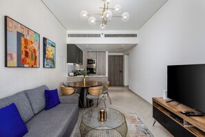 Appartement Deluxe, balcon, vue ville | Coin séjour