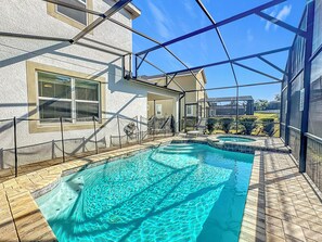 A heated pool - Relaxing Vacation Home with Pool in Solara Resort 7 Bedrooms/6.5 Bathrooms
 (Kissimmee)