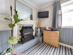 Deluxe-Suite | Individuell dekoriert, individuell eingerichtet, Bügeleisen/Bügelbrett