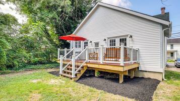 Enjoy outdoor activities on the spacious deck with a covered area and take in the serene surroundings.