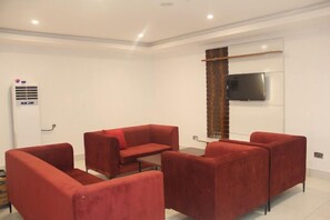 Habitació Deluxe, balcó, vistes a la ciutat | Sala d'estar