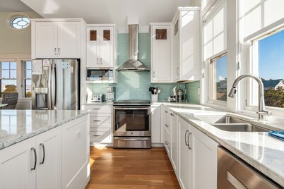 Ocean front 5 bedroom reverse floor plan home! Access to both clubs and 2 new golf carts