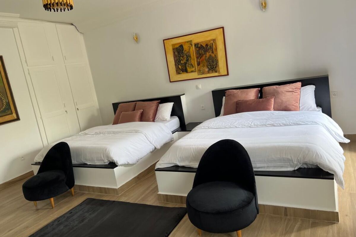 1 غرفة نوم ومكواة/لوح كي وواي فاي وملاءات أسرّة