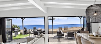 Spacious 5-bedroom Beachfront Home on Beach Road!