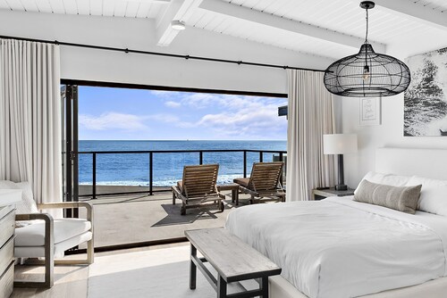 Spacious 5-bedroom Beachfront Home on Beach Road!  STR24-0030