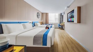 A modern hotel room with a large bed, a desk, and a television mounted on the wall. - Homeinn · neo (Changzhi Medical College) (Changzhi)
