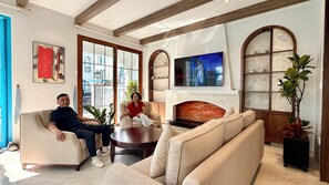 Premier Villa | Living area | 18-inch flat-screen TV with cable channels
