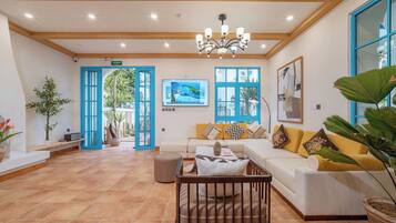 Romantic Villa | Living room | 18-inch flat-screen TV with cable channels