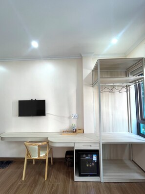 Luksus-dobbelt- eller tomannsrom, byutsikt | Sengetøy av topp kvalitet, dundyner, senger med overmadrass og minibar