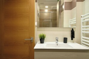 Hair dryer, towels, soap, shampoo
