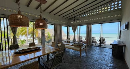 Charming oceanfront cabin with stunning views, private terrace, and beach access