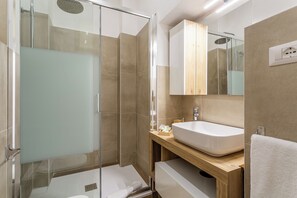 Hair dryer, towels, soap, shampoo