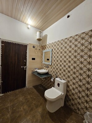 Luxury Double or Twin Room, Garden View | Bathroom | Slippers - The Vanashrya Ranthambore  (Sawai Madhopur)