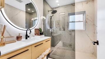Shower, hair dryer, towels, soap