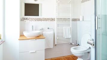 Shower, hair dryer, soap, shampoo