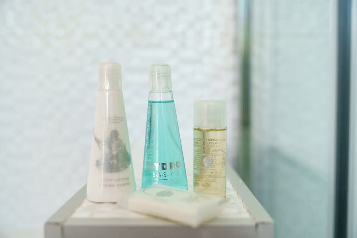 Shower, hair dryer, soap, shampoo