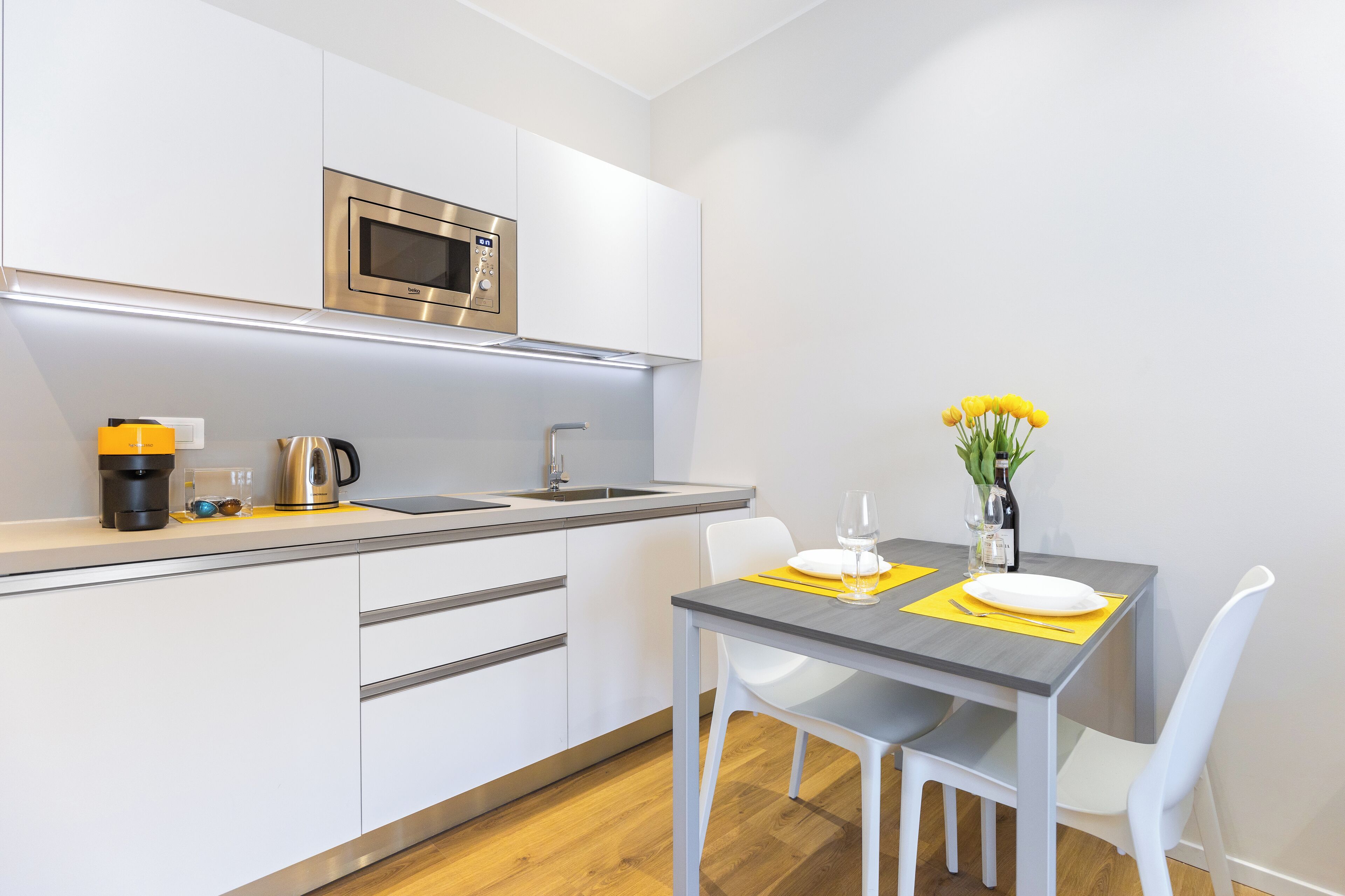 Fridge, microwave, stovetop, coffee/tea maker