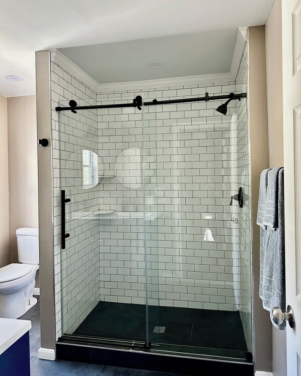 Shower, towels, soap, shampoo