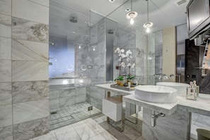 Jetted tub, hair dryer, towels, soap
