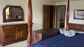 1 bedroom, desk, iron/ironing board, travel crib