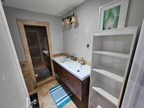 Hair dryer, towels, soap, toilet paper