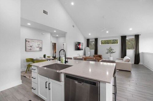 Stylish Downtown Retreat w/ Balcony, Reserved Parking + Walkable Access