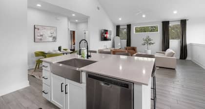 Stylish Downtown Retreat w/ Balcony, Reserved Parking + Walkable Access
