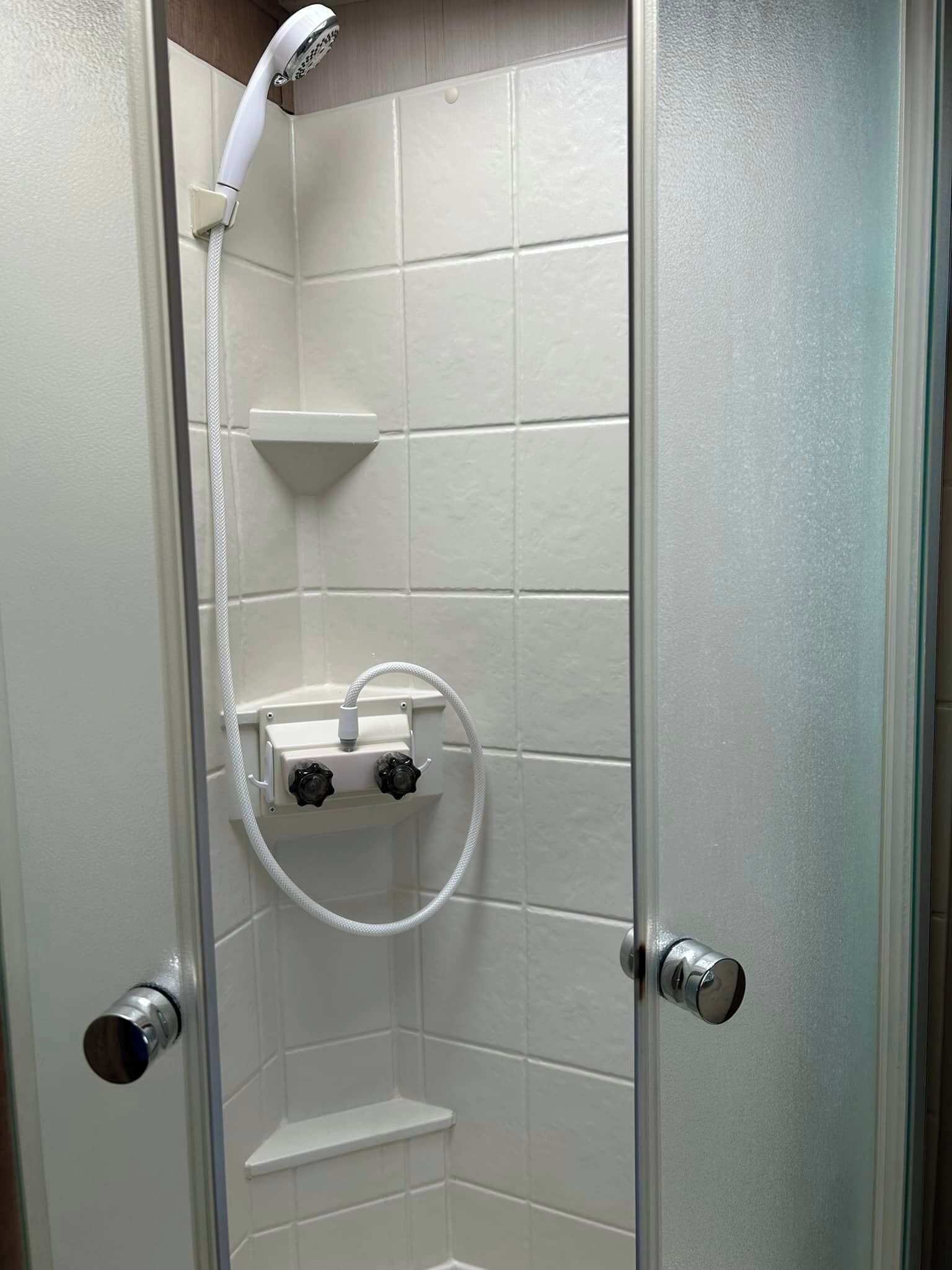 Shower, towels, toilet paper