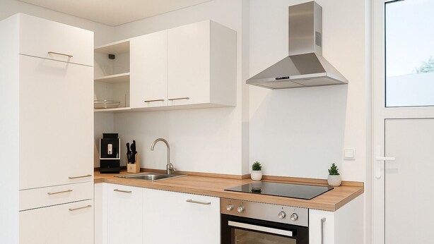A modern kitchen with white cabinetry, a stainless steel range hood, a built-in oven, and a wooden countertop. - Lux Suites Leipzig Luxury Apartment (Leipzig)