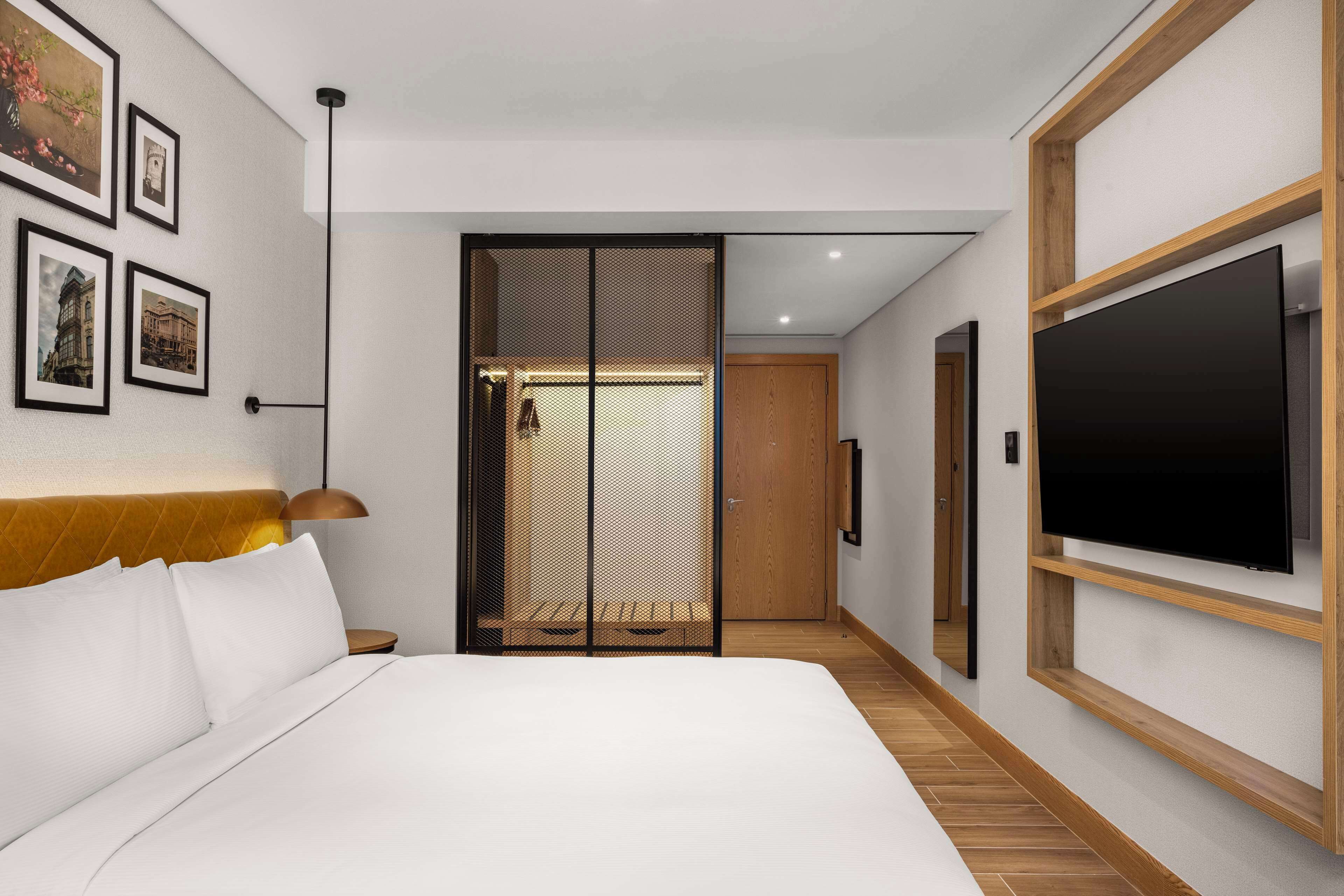 King Room with Atrium View | Premium bedding, memory-foam beds, minibar, in-room safe