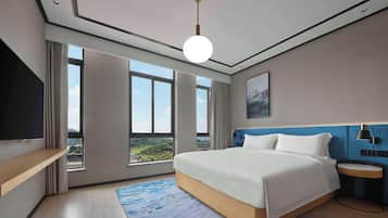 Suite Deluxe, 1 letto king | Cassaforte in camera, Wi-Fi gratuito
