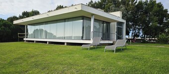 Casa Oliveira, golf e lagoa