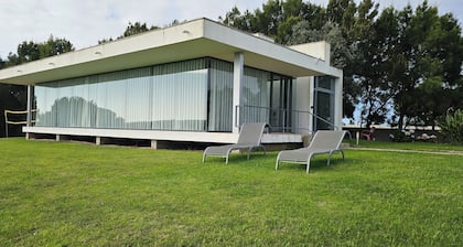 Casa Oliveira, golf e lagoa