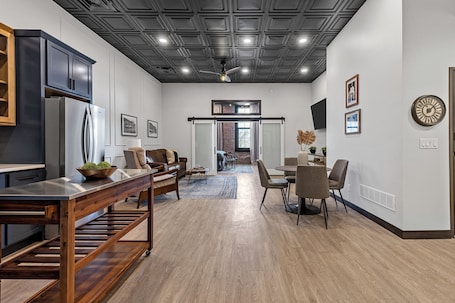Interior. Modern + Historic - "Williams Suite" Overlooking DT Williamsburg, IA