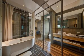 A modern bathroom with a freestanding bathtub, a glass shower enclosure, and a large mirror. - Meet Sun Moon Lake (Nantou)
