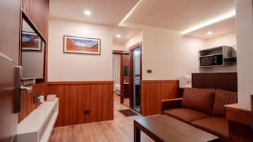 Familien-Vierbettzimmer, Stadtblick | Wohnbereich