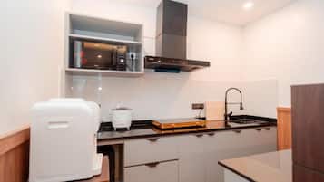 Chambre Quadruple Familiale, vue ville | Cuisine privée