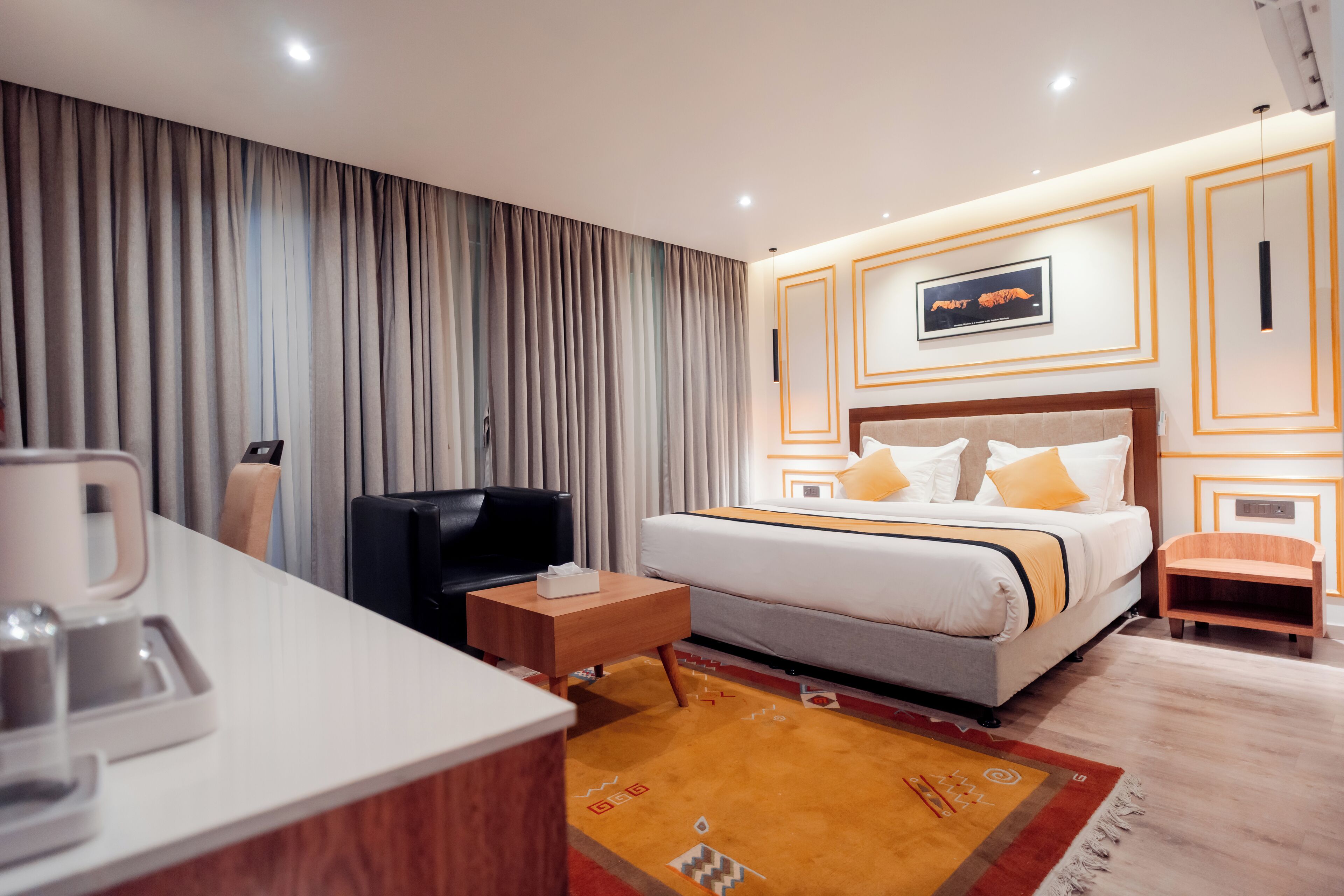 Deluxe Double Room, Balcony, City View | In-room safe, desk, laptop workspace, blackout drapes