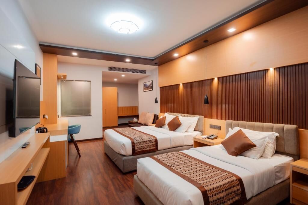 Family Double or Twin Room, City View | In-room safe, desk, laptop workspace, blackout drapes