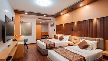 Family Double or Twin Room, City View | In-room safe, desk, laptop workspace, blackout curtains