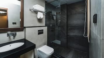 Shower, hair dryer, slippers, towels