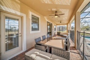 Outdoor dining - Unforgettable Family Fun Awaits at this Epic 8BR ChampionsGate Resort Home! (Four Corners)