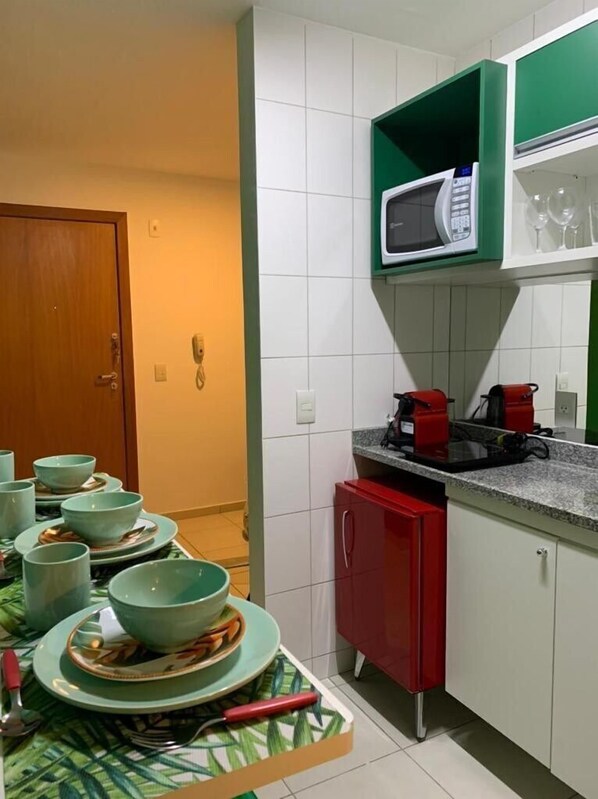 Microwave, coffee/tea maker, cookware/dishes/utensils