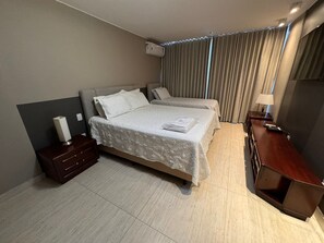 1 habitación, tabla de planchar con plancha, internet y ropa de cama 