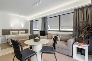 Momo Suites, Acropolis by Aura Homes C | Living area | 40-inch flat-screen TV with digital channels - Momo Suites Acropolis by Aura Homes (Athens)